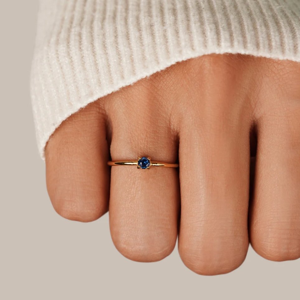 December's Dazzle: Birthstone Elegance Ring